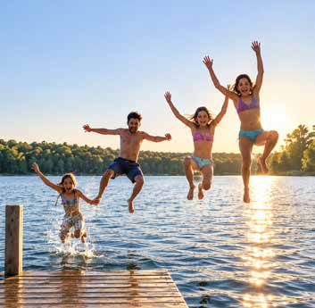 Kids jumping off a dock
