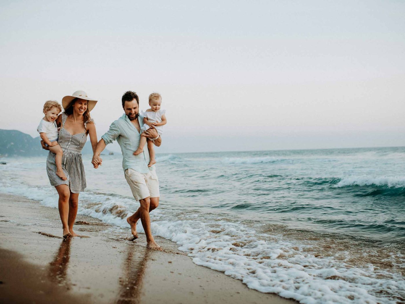 Family walking along the Lake Simcoe shoreline